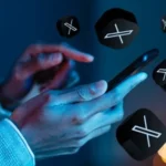 imagem de uma celular com símbolos do X - Twitter vende perfis de usuários
